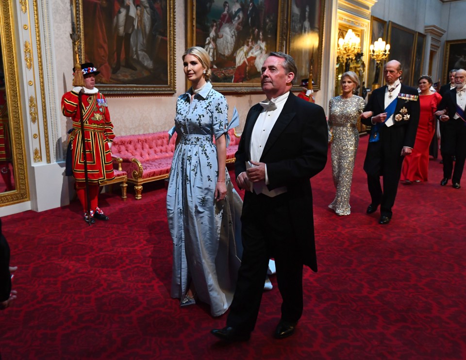 Ivanka looked chic in a sequined blue dress, accompanied by the Secretary of State for International Trade, Liam Fox