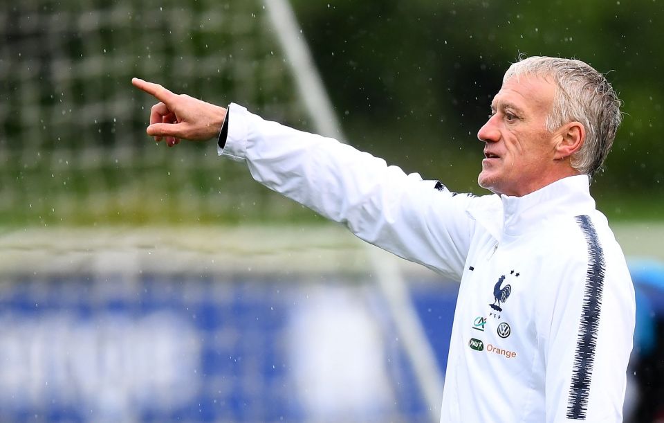  Didier Deschamps gives instructions to his players ahead of this contest at the top of Group H