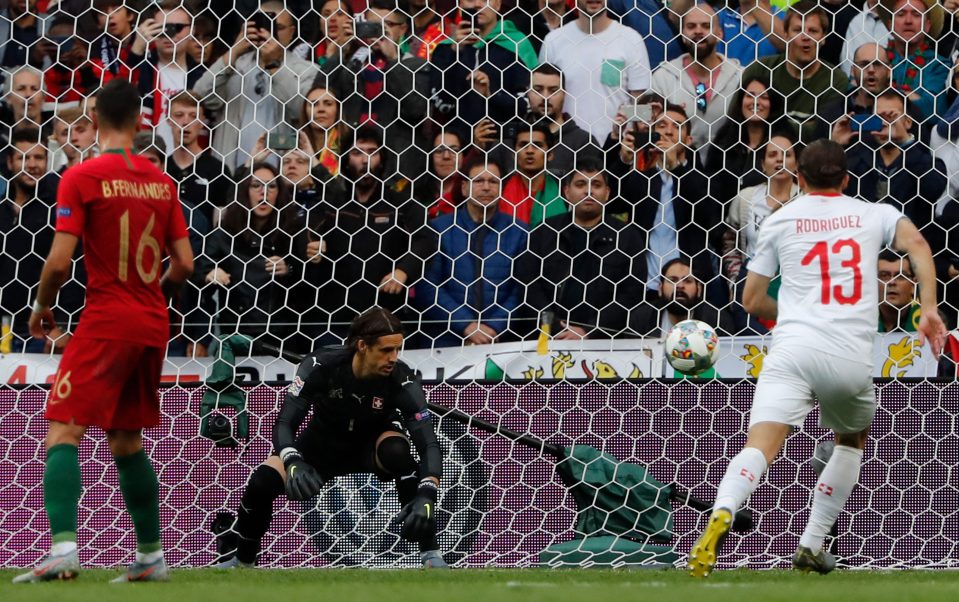  Switzerland keeper Yann Sommer is beaten and seemingly bemused by this Cristiano Ronaldo free-kick