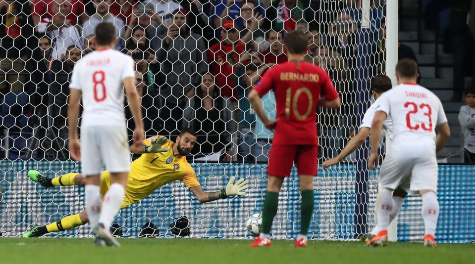  Rui Patricio might be disappointed he failed to keep out this so-so penalty equaliser from Ricardo Rodriguez after diving the right way