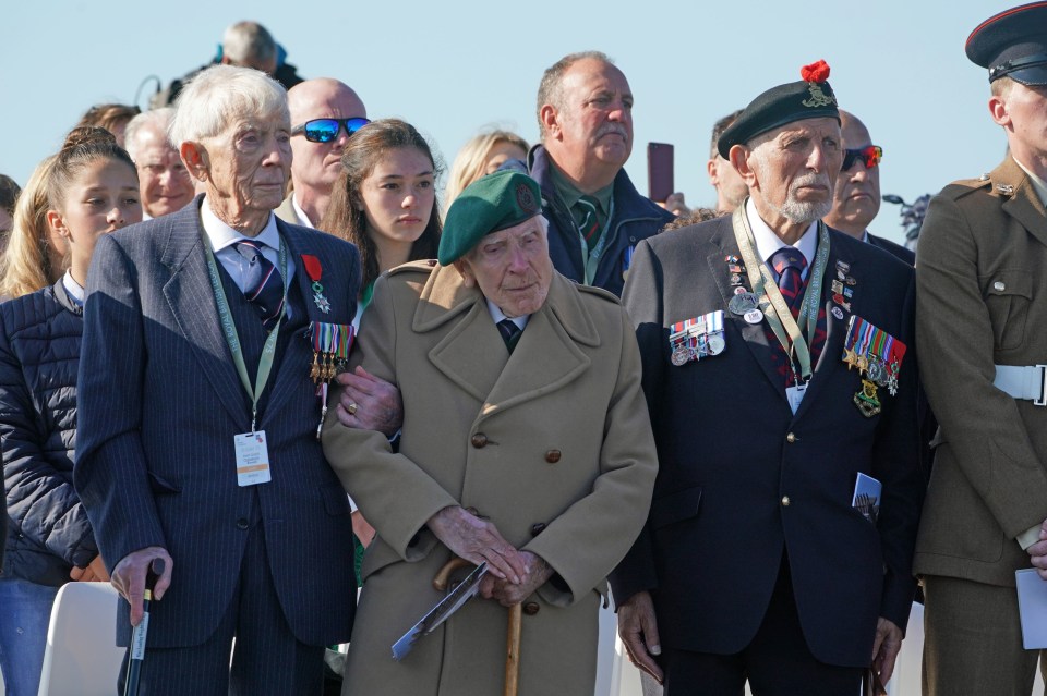 D-Day veterans standing proudly at the inauguration of the British Normandy Memorial site in Ver-sur-Mer – Theresa May paid tribute to their generation’s ‘ultimate sacrifice’