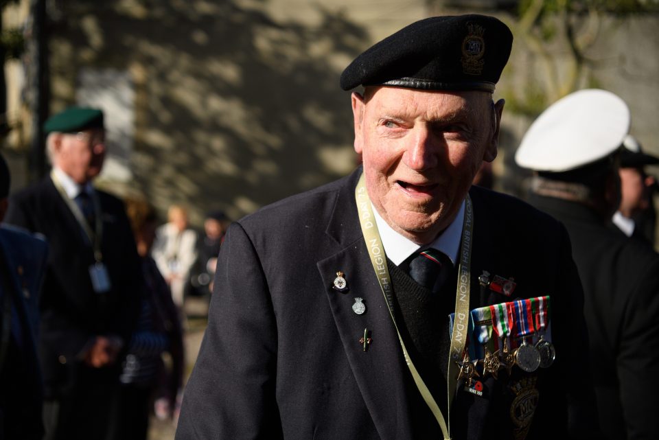  Veteran Tony Cash talks with pals outside the service of remembrance at Bayeux Cathedral