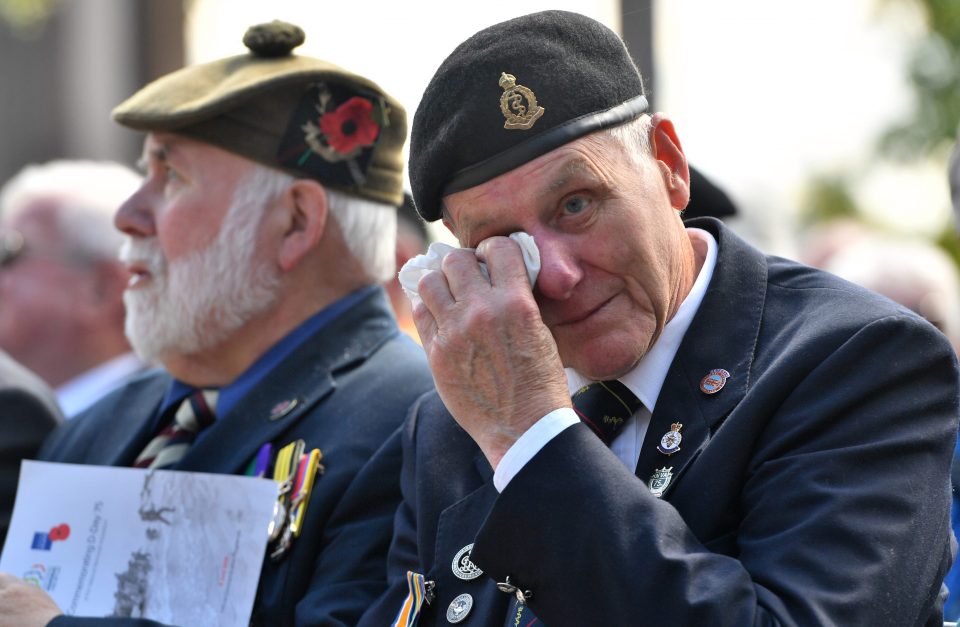  A veteran weeps at a commemoration service at The National Memorial Arboretum in Alrewas, Staffordshire