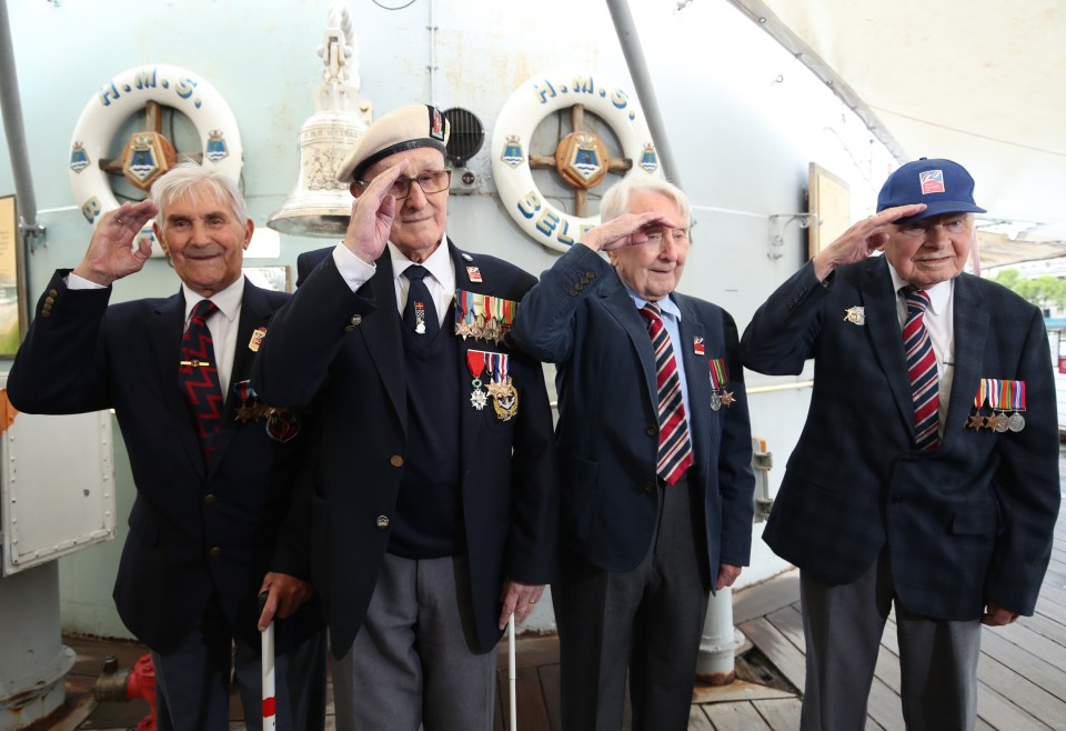 John Connelly, Nev Lees and Bob Jones from Blind Veterans UK during a photocall on board HMS Belfast in London