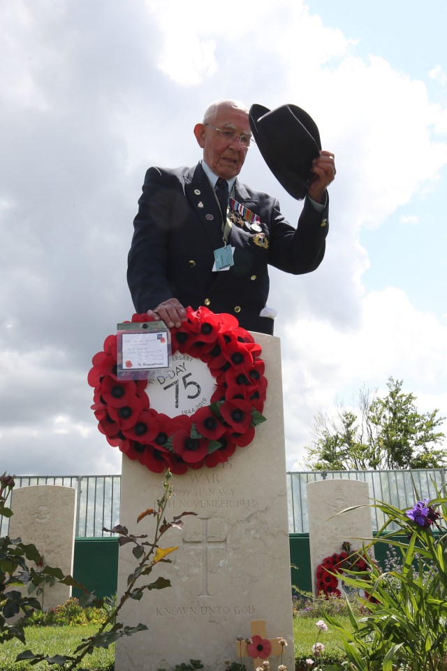 Veteran Vincent Horton, 93, from Stoke-On-Trent, lays a wreath at the Commonwealth War Graves Commission Cemetery