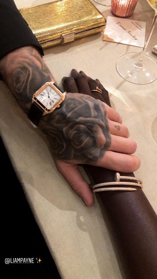  Duckie shared a sweet picture of Liam’s tattooed hand holding hers on social media