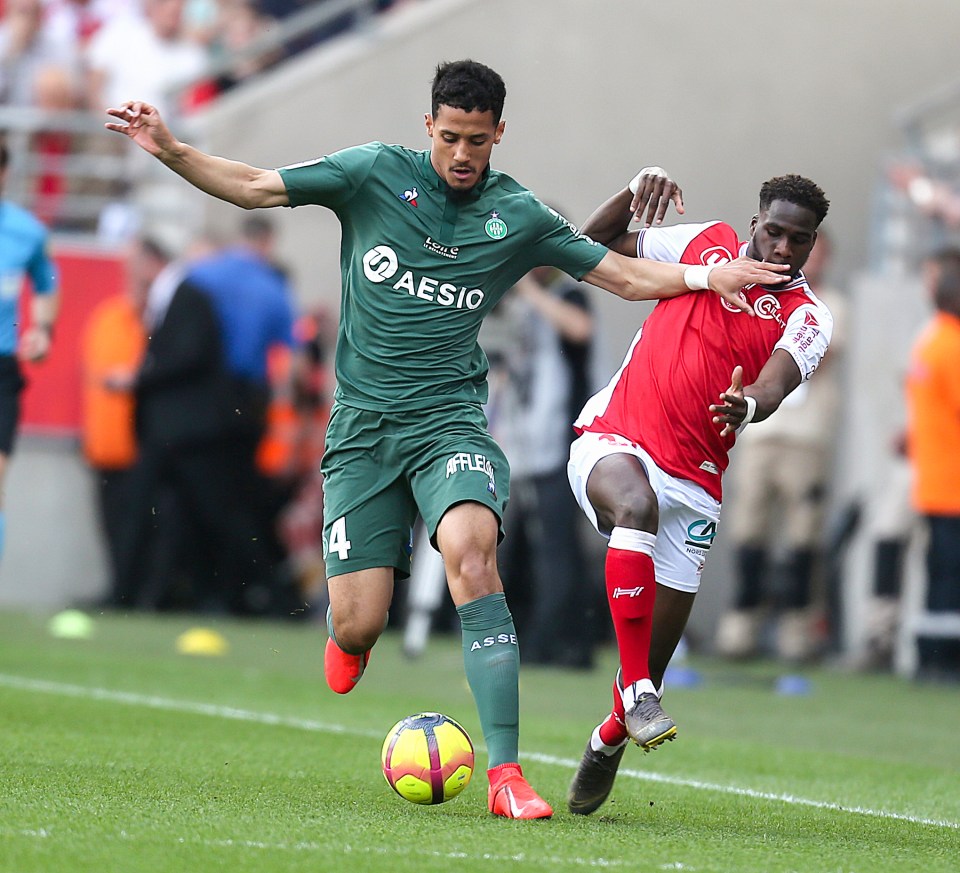  Saint-Etienne's William Saliba muscles Boulaye Dia of Stade de Reims off the ball