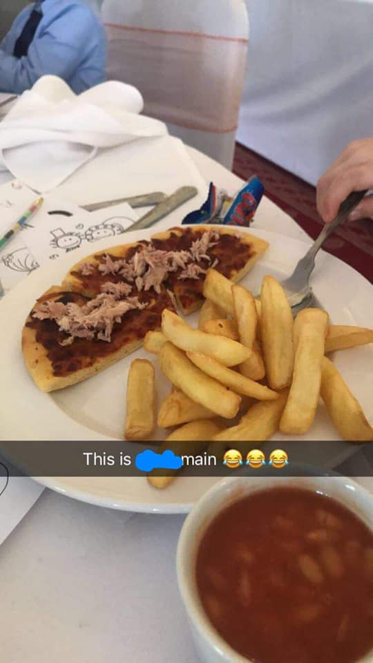  Kids were served half a pizza topped with tinned tuna