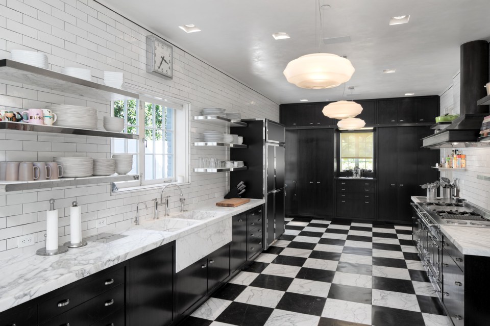  The black and white kitchen is the perfect place to whip up food