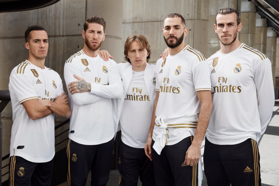  Bale doesn't look impressed as he lines up in new kit alongside Vasquez, Ramos, Modric and Benzema