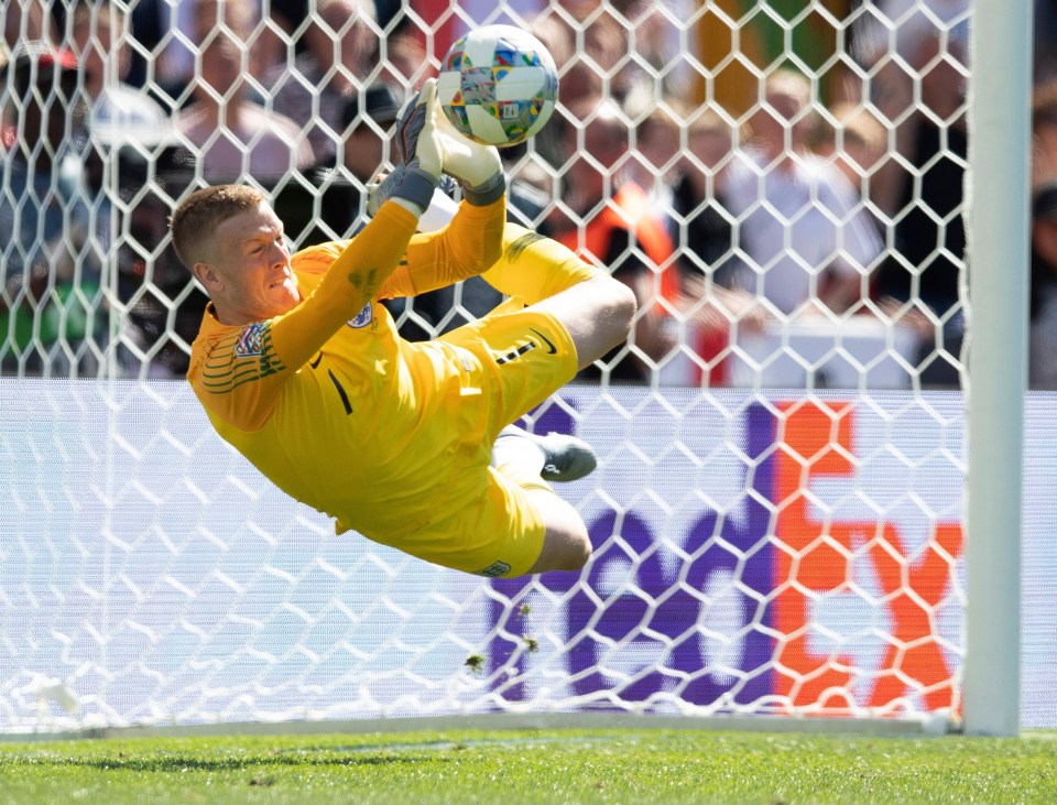 Pickford flew across to his right to push away Josip Drmic's effort