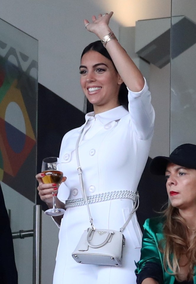  The brunette gave the Portuguese superstar a wave from her box just moments before the match action got underway