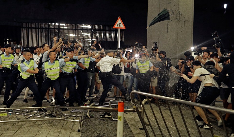  Police reacted violently when demonstrators outside government headquarters outstayed a protest permit