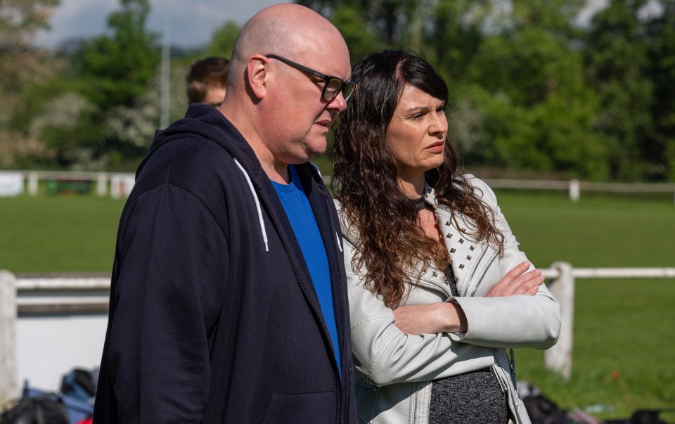  Paddy and Chas look serious watching the match