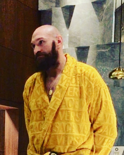  Fury is a lover of designer brands, here seen wearing a Versace robe