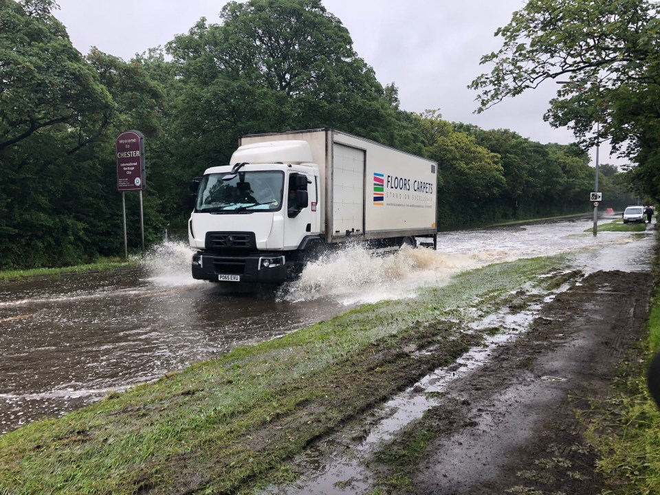 Floods began to make driving difficult on Parkgate Road in Chester today