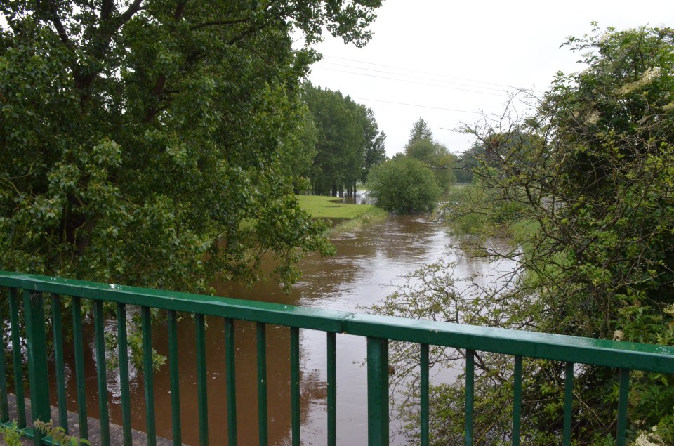 The River Weaver burst its banks in Cheshire today after heavy rain