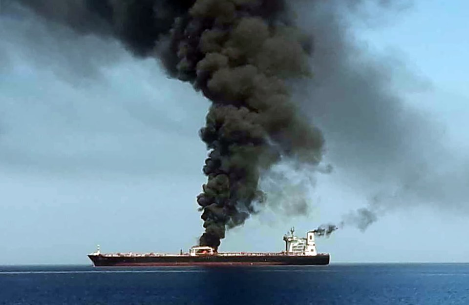  One of the tankers on fire in the Gulf of Oman following the suspected torpedo attack