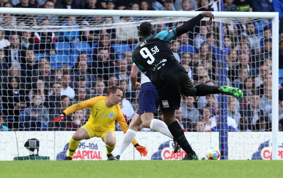  Usian Bolt expertly found the bottom right corner after latching onto a mistake from Jamie Carragher