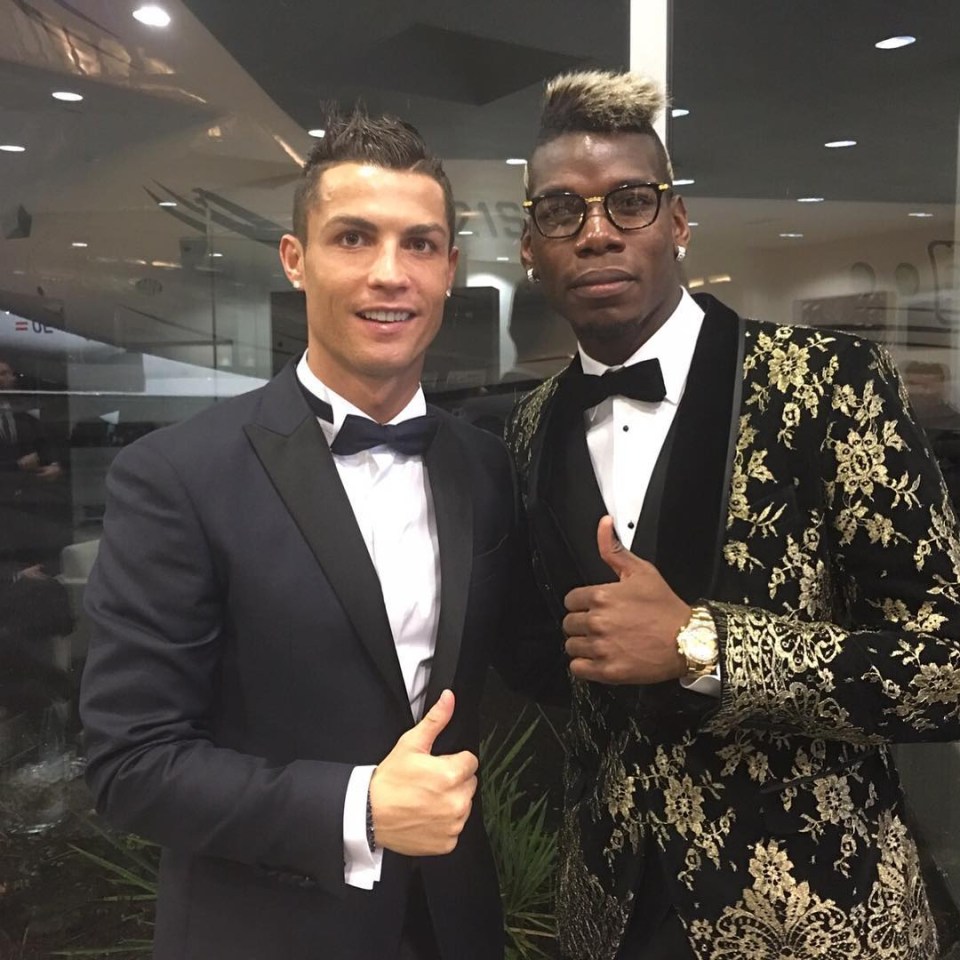  Pogba poses with Cristiano Ronaldo at the 2015 Ballon d'Or wearing a black D&G blazer Pogba worth £2,554