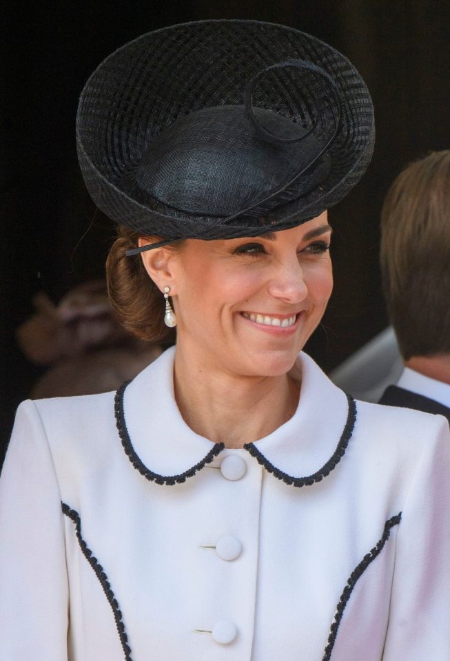  The 37-year-old royal wore a black fascinator and pearl-drop earrings