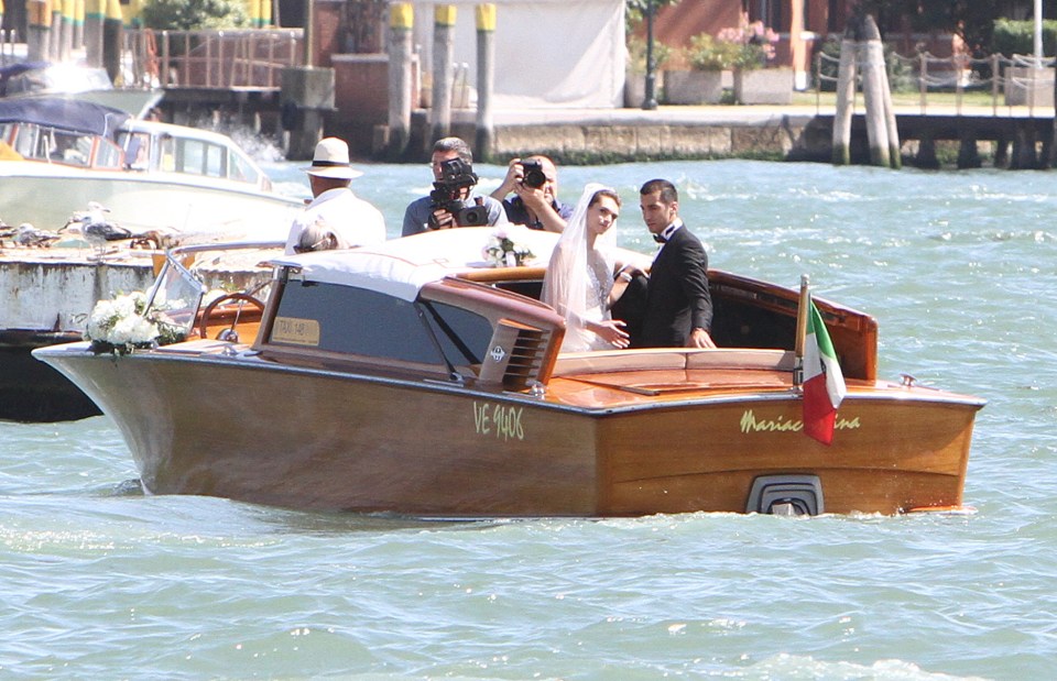  The couple enjoyed a romantic boat ride through Venice on their big day