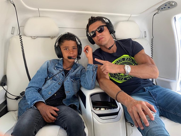  Ronaldo and son Cristiano Jr looked chilled as they boarded their private jet