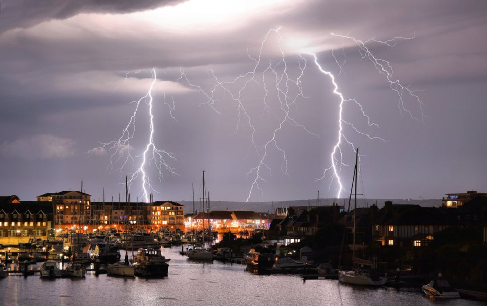  Lightning storm in Eastbourne, as torrential rain and a 'spectacular electrical storm' lashed parts of the UK overnight on Tuesday