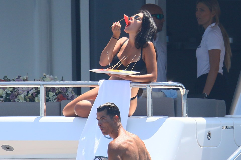 Ronaldo watches on as Rodriguez enjoys a snack on board the vessel