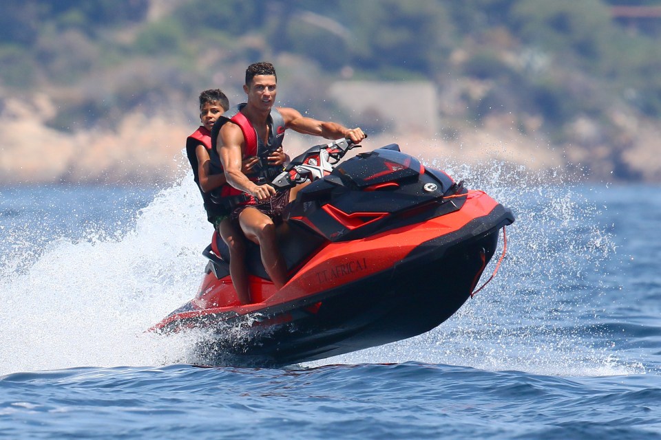 Ronaldo caught some air as they played on the luxury toy