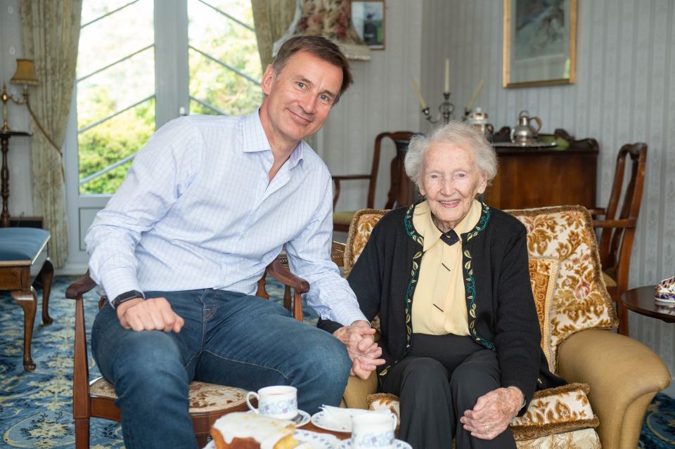  Jeremy Hunt - seen here with his 99-year-old great aunt Bettie - attacked Boris today for running away from debates