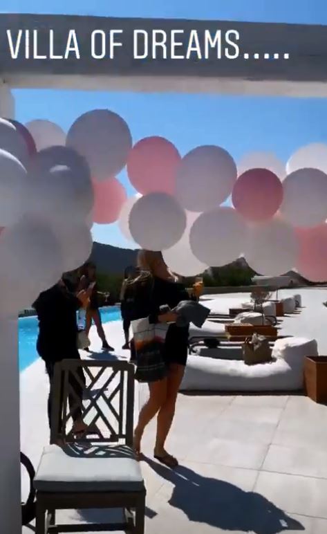  The villa was kitted out with pink and white balloons