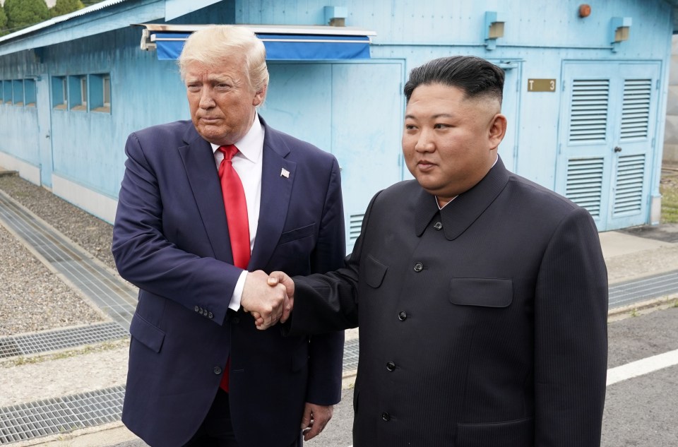  Trump and the North Korean leader shake hands at the demilitarised zone