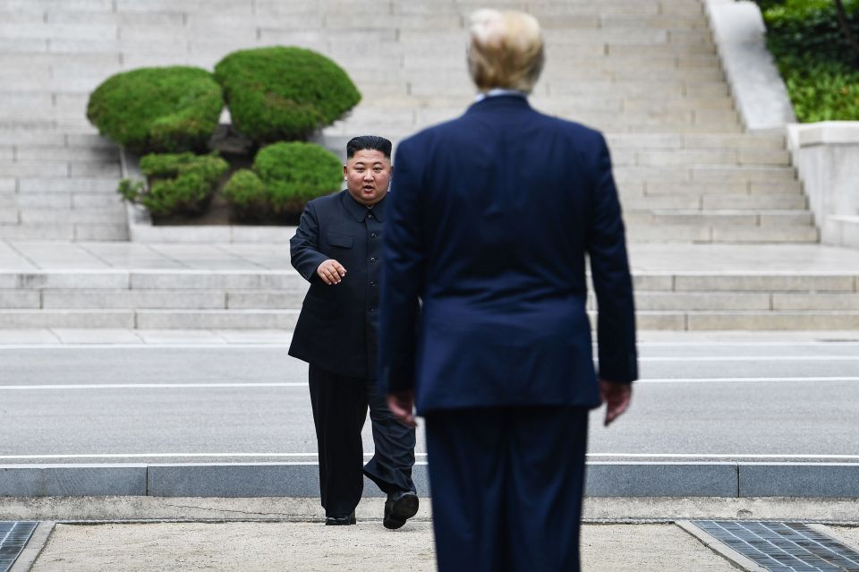  Kim Jong-un can be seen marching towards Trump who had been waiting to met him