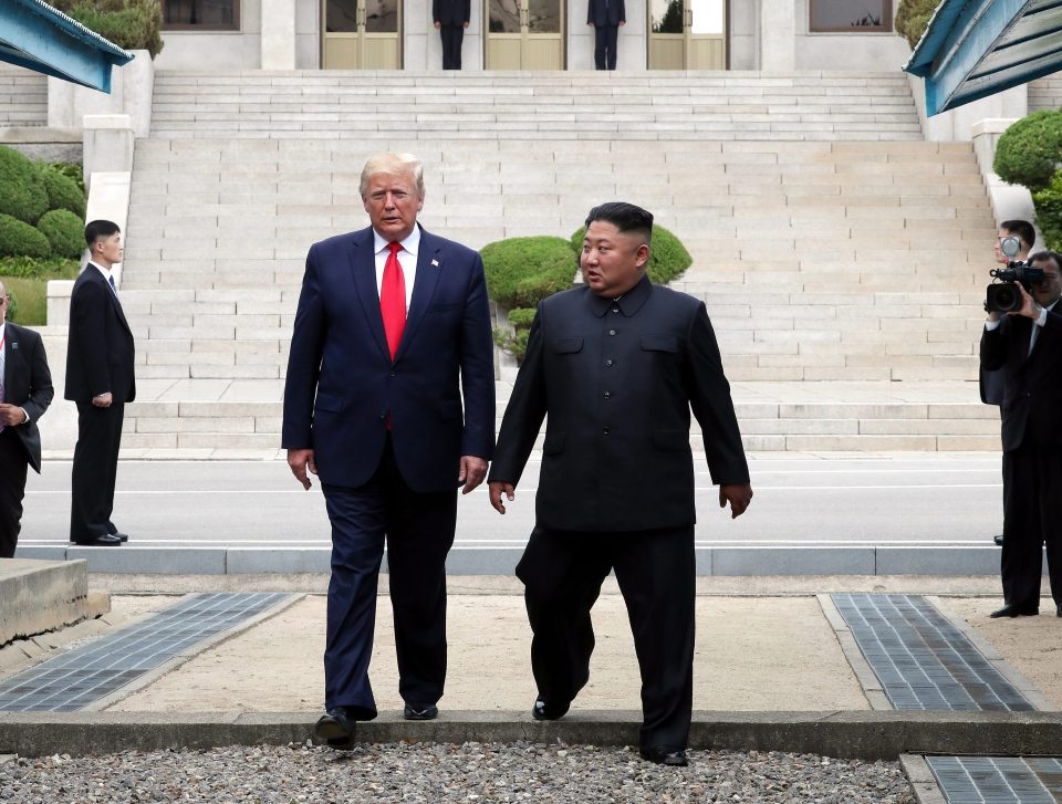  North Korean leader Kim Jong-un and US President Donald Trump inside the demilitarised zone