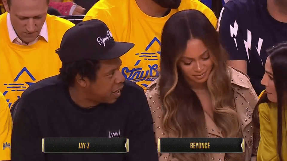  Beyonce didn't look impressed as the woman spoke to Jay Z