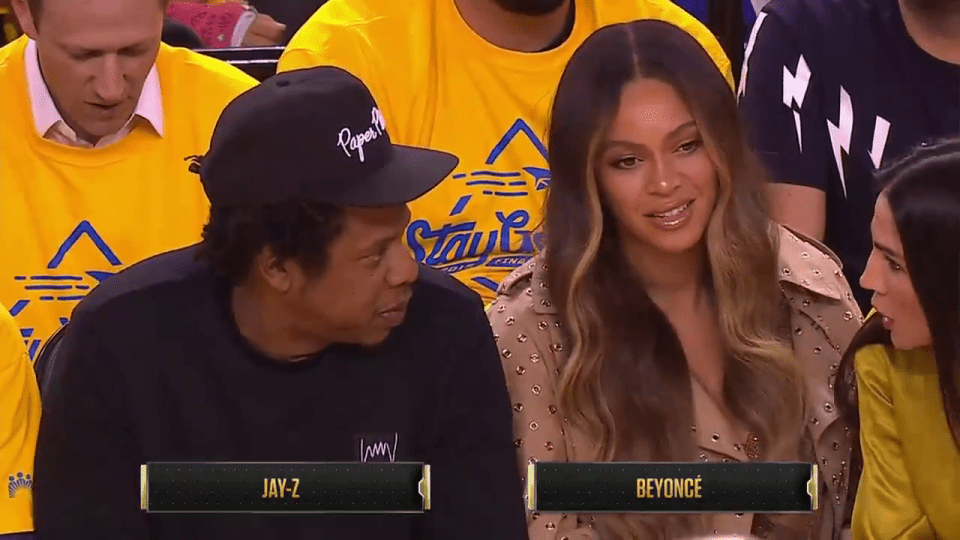  Beyonce would not look at the woman who had leaned over her to speak to Jay Z and appeared to give her a little shove