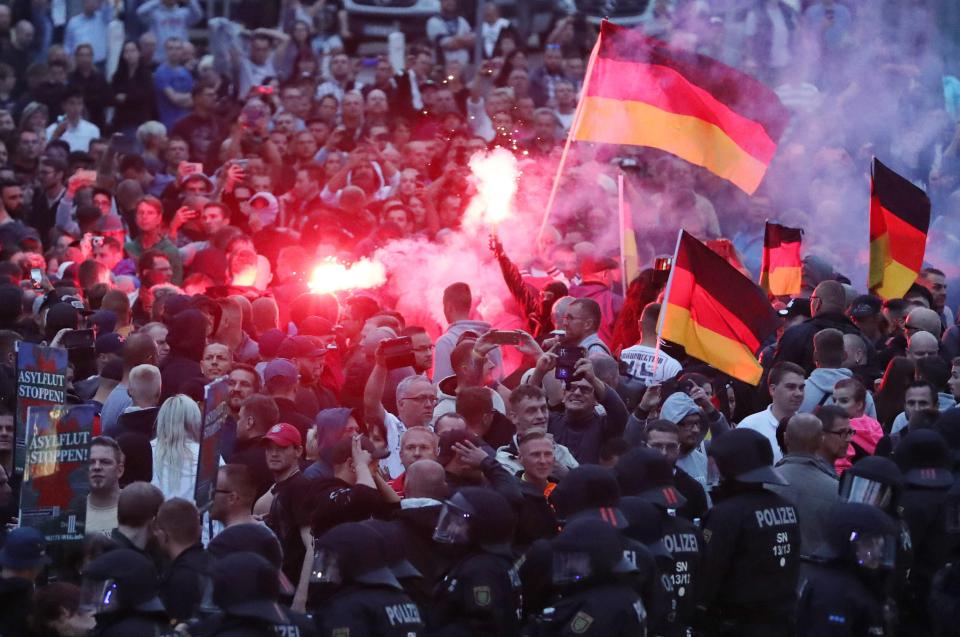  Right wing demonstrators lighting flares in Chemnitz