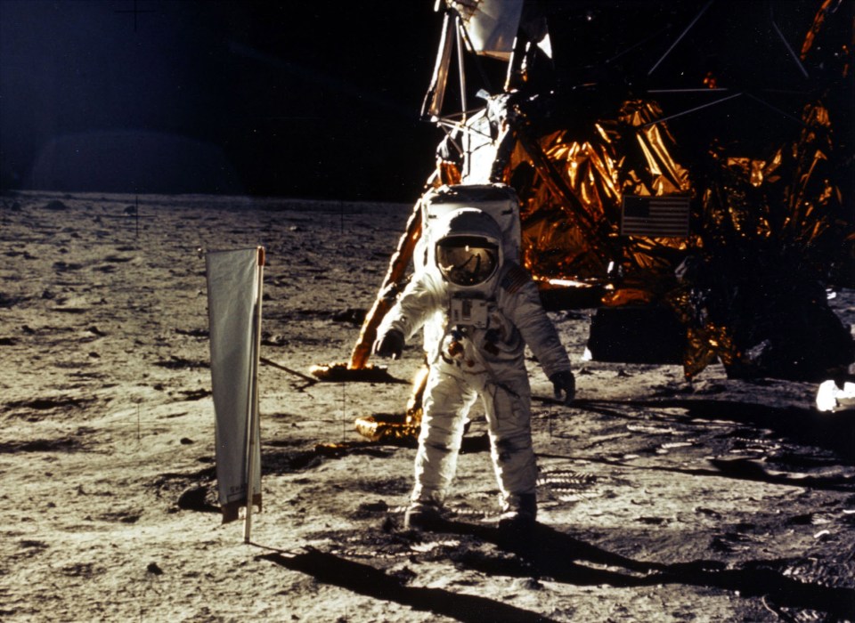  The deployment of scientific experiments by Astronaut Edwin Aldrin Jr. is photographed by Astronaut Neil Armstrong