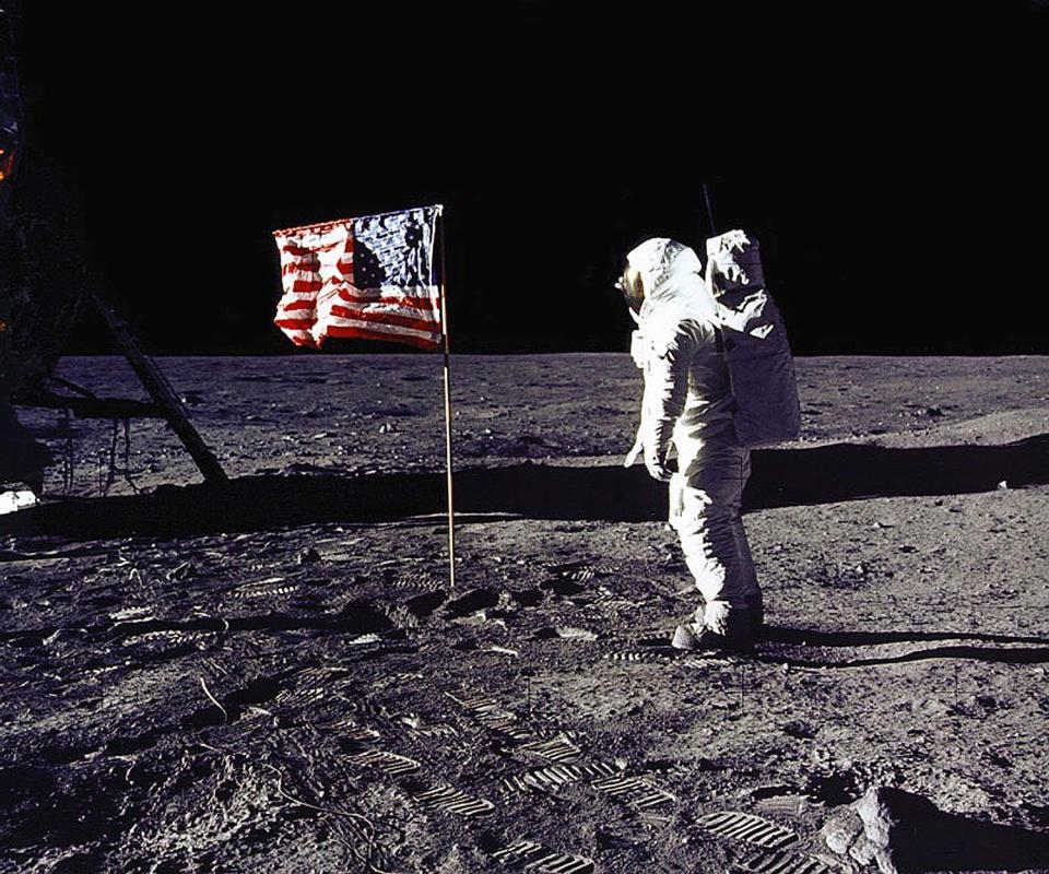  In this image provided by NASA, astronaut Buzz Aldrin poses for a photograph beside the U.S. flag deployed on the moon during the Apollo 11 mission on July 20, 1969