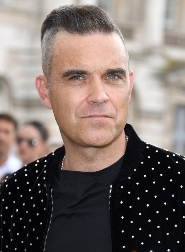  Robbie Williams revealed 'dark energy' in a haunted London house combined with heavy cocaine use made him convinced he'd kill himself