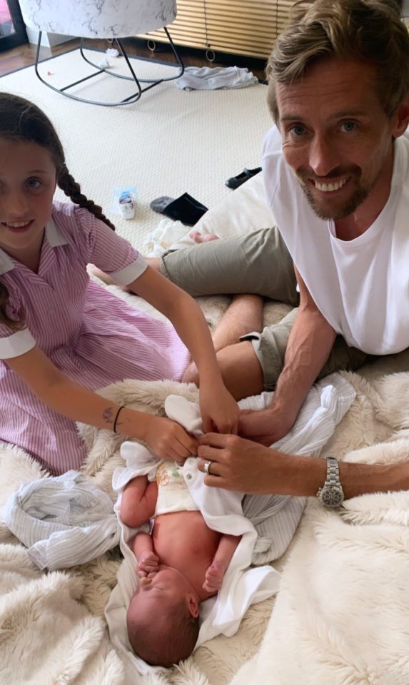  The ex-footballer has been getting stuck into nappy-changing