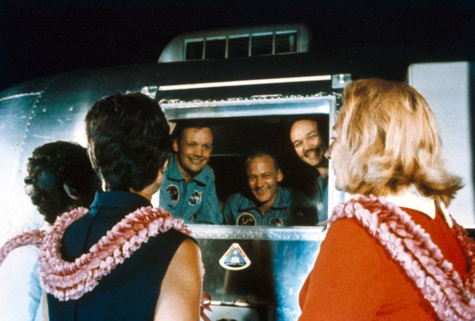  Astronauts Neil Armstrong, Edwin Buzz Aldrin and Michael Collins are greeted by their wives aboard the USS Hornet