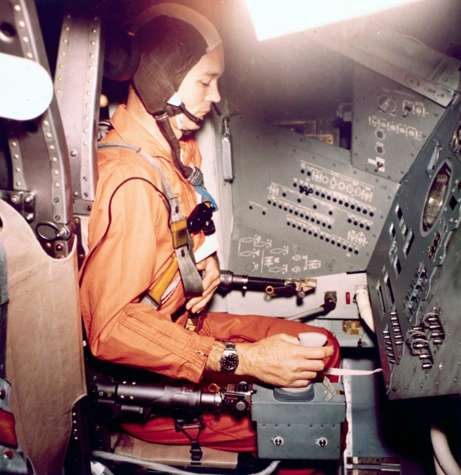 Collins is sitting in a gondola during centrifugal training for his flight at the Manned Spacecraft Centre