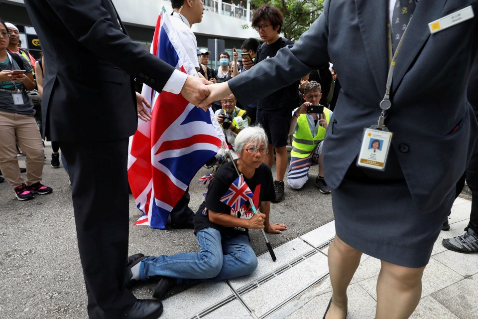  Protesters oppose Beijing influence in Hong Kong, which has grown since the end of British rule in 1997