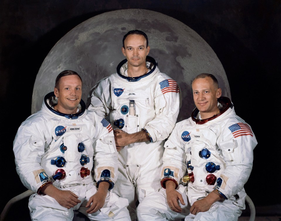  Apollo 11 lunar landing mission crew with (from left) mission commander Neil Armstrong, command module pilot Michael Collins and lunar module pilot Edwin 'Buzz' Aldrin posing in their space suits