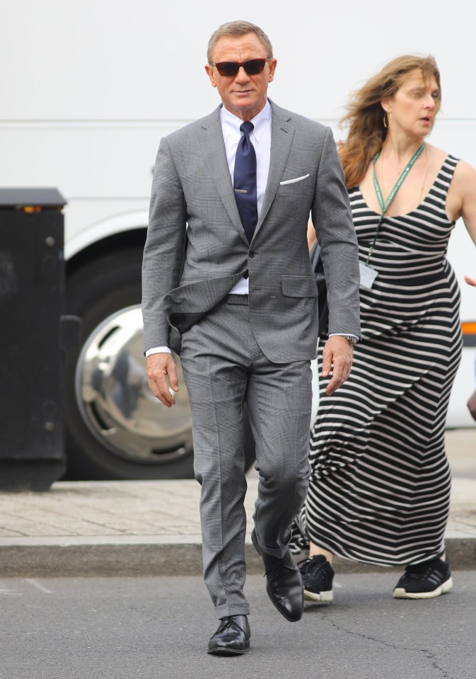 Daniel Craig gave onlookers more than they bargained for in tight grey suit trousers