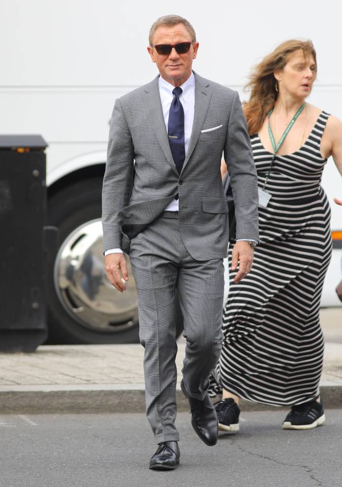  Daniel Craig gave onlookers more than they bargained for in tight grey suit trousers