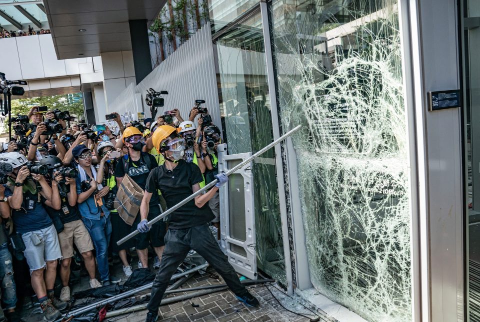  Last month demonstrators smashed a large hole through the bottom of a floor-to-ceiling window