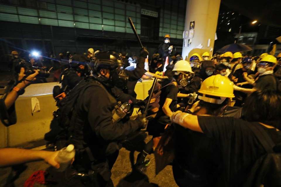  Riot police clashed with protesters last month as they arrive to disperse protesters from the Legislative Council Building